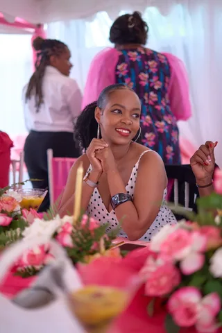 An Eladation guest enjoying conversation at the table